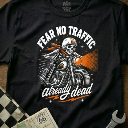 Black t-shirt graphic of a skeleton biker with text "FEAR NO TRAFFIC already dead".