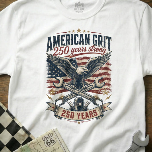 White t-shirt with "American Grit 250 years strong" text and eagle graphic.