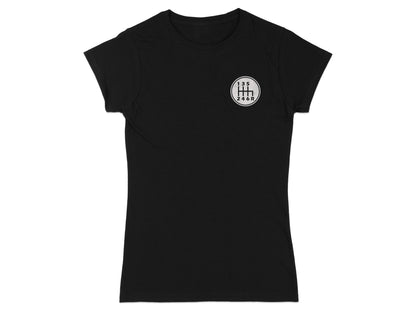 Black t-shirt with a white manual gear shift pattern logo on the chest.