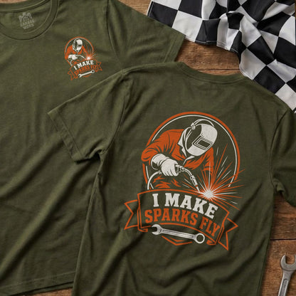 Green t-shirt with graphic of welder and text "I MAKE SPARKS FLY".