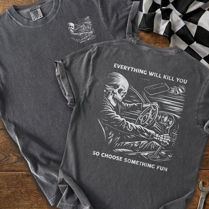 Dark t-shirt with skeleton driver graphic and text "Everything will kill you so choose something fun."