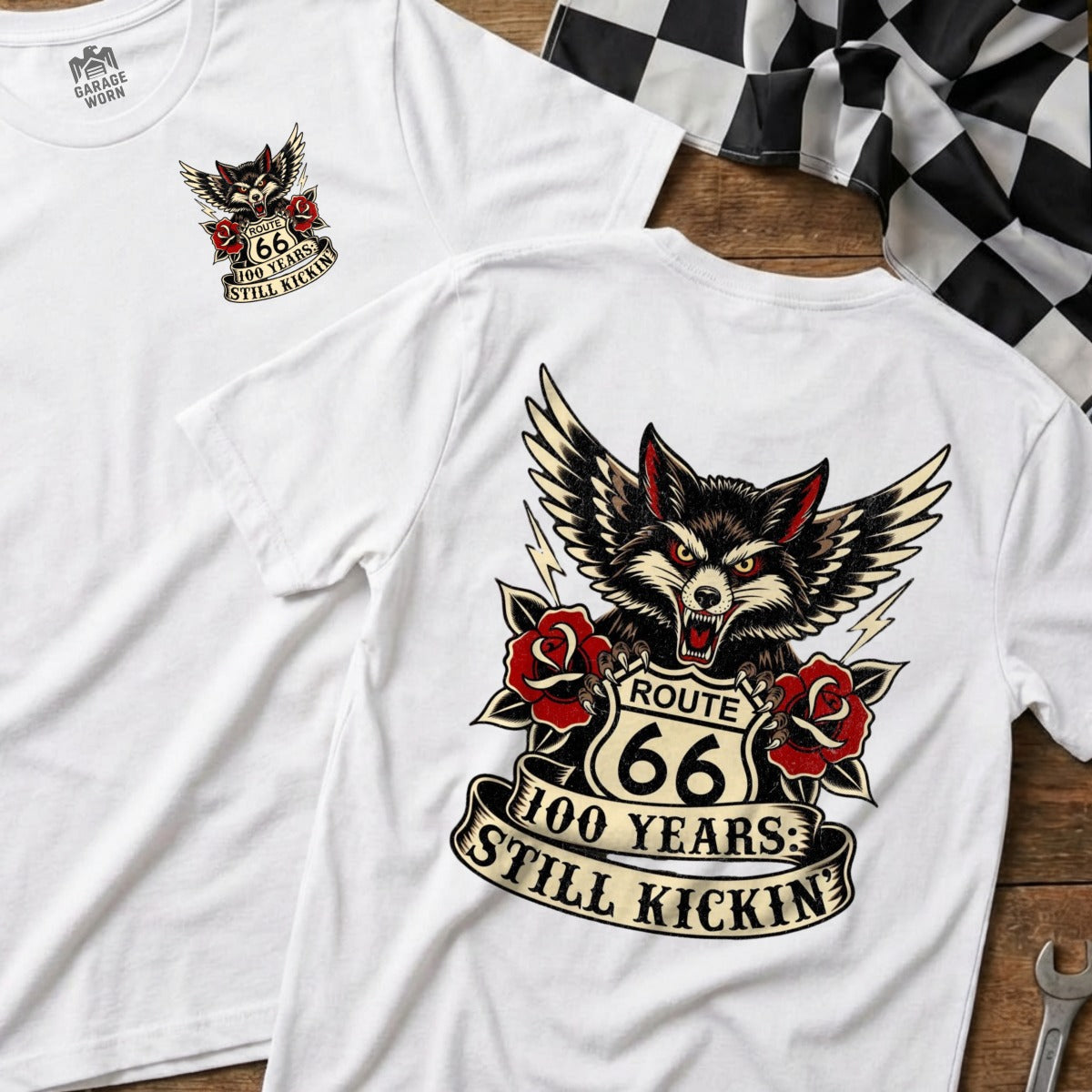 White t-shirts featuring Route 66 logo, wolf, and "100 Years: Still Kickin'" text.
