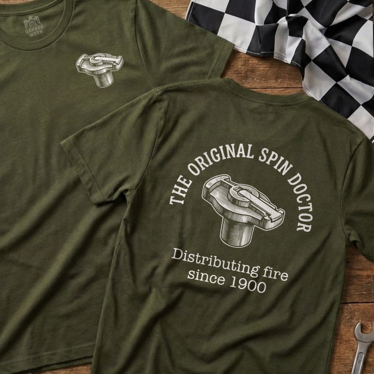Green t-shirt with "The Original Spin Doctor Distributing fire since 1900" and rotor graphic.