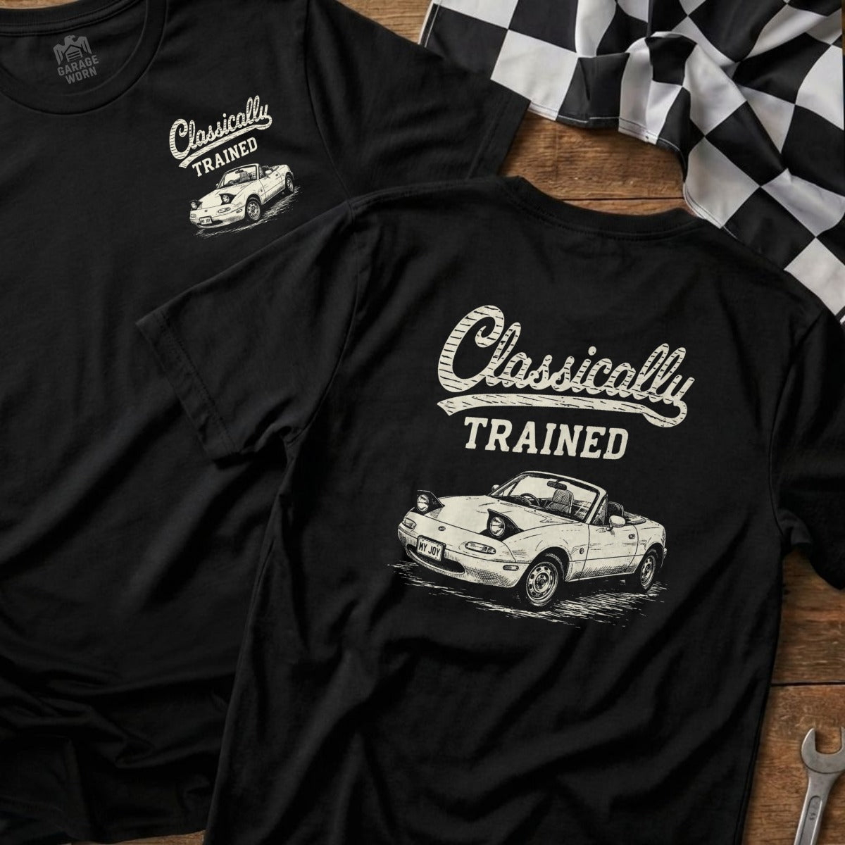 Black t-shirt with "Classically TRAINED" text and a white convertible car illustration.