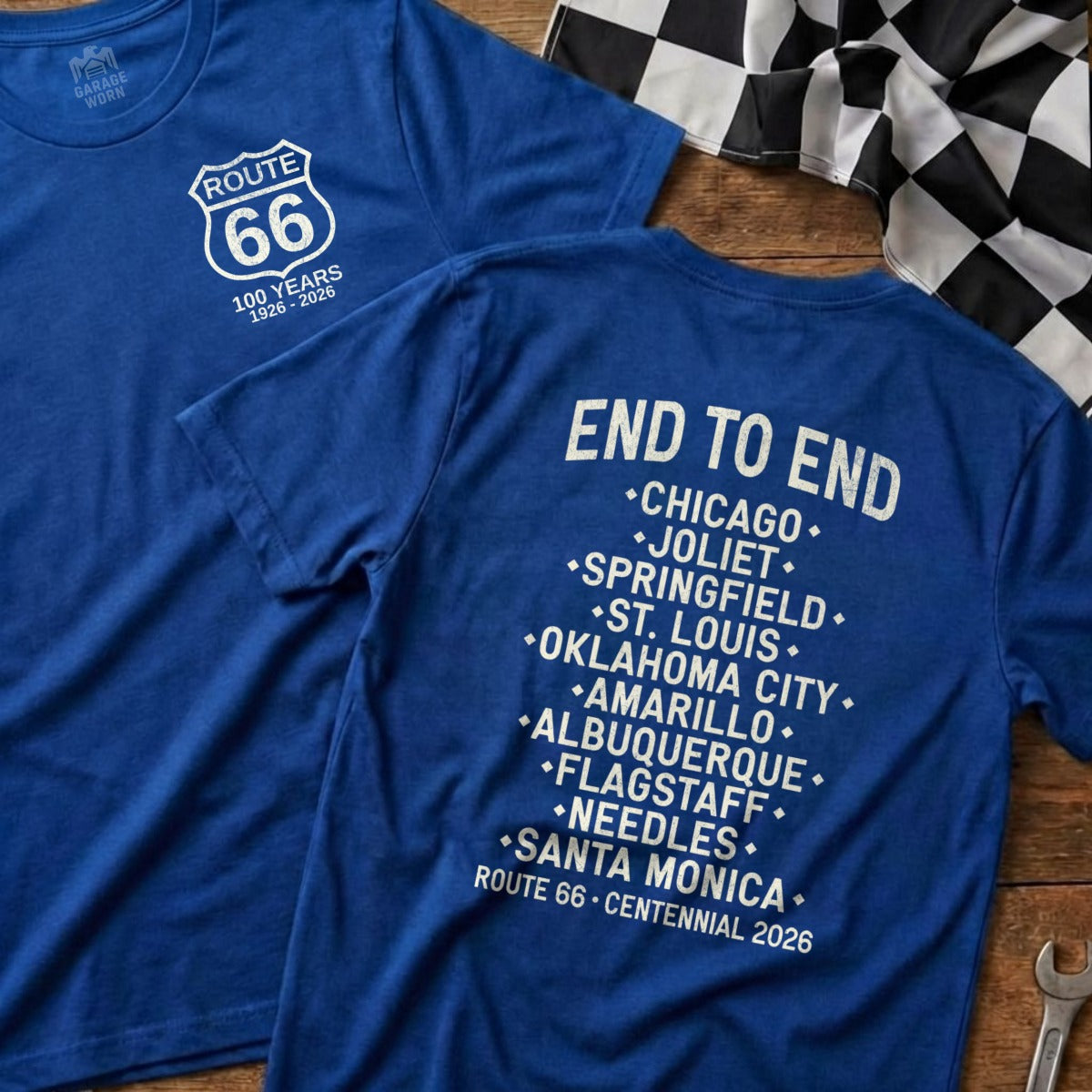 Blue t-shirt with Route 66 logo and list of cities for Centennial 2026.