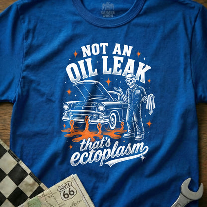 Skeleton mechanic with a car, "Not an oil leak, that's ectoplasm" text.