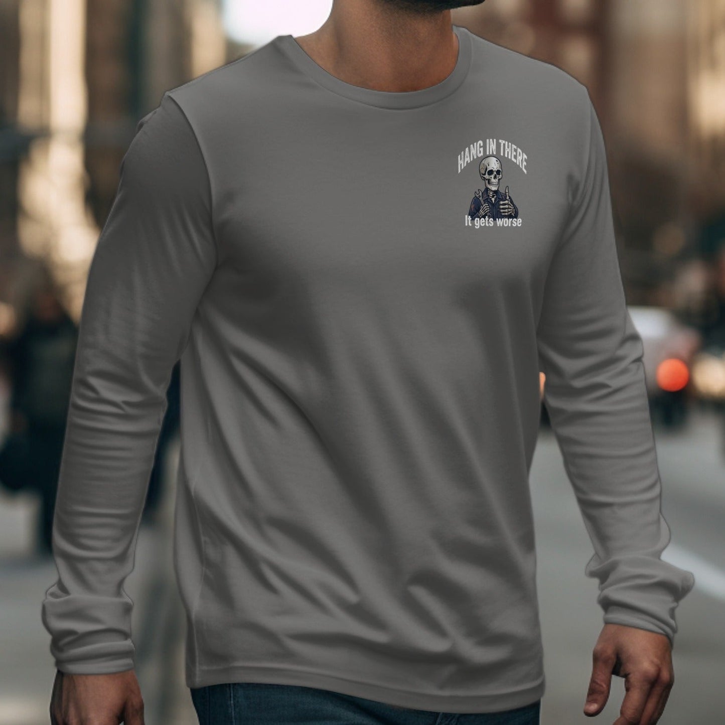 Gray long-sleeve t-shirt with skeleton graphic saying "Hang in There."