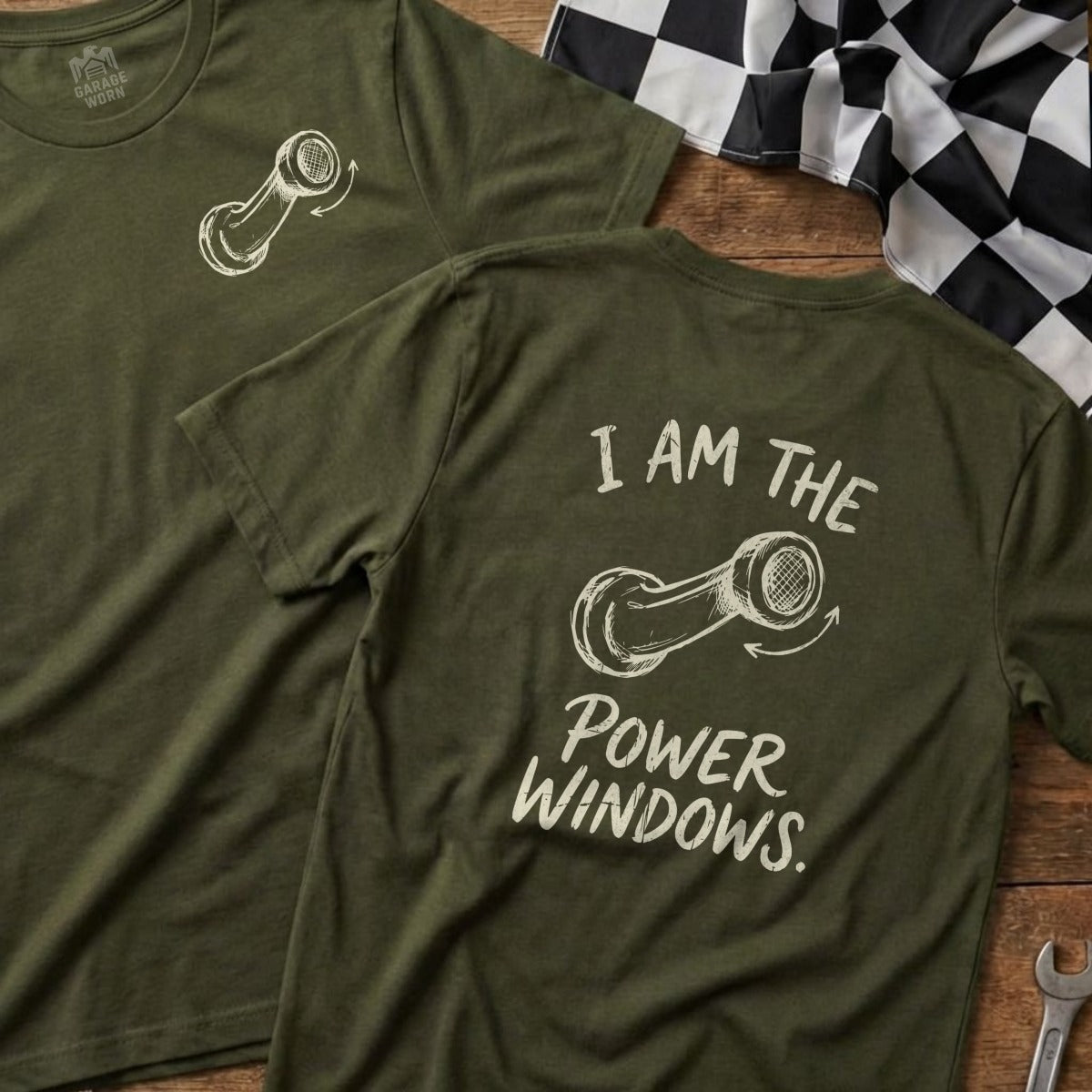 Green t-shirt with "I AM THE POWER WINDOWS." graphic on the back.
