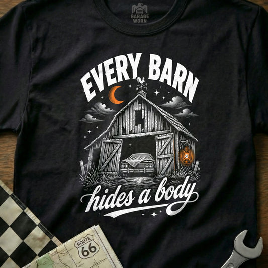 Black t-shirt with "Every Barn Hides a Body" text and barn graphic.