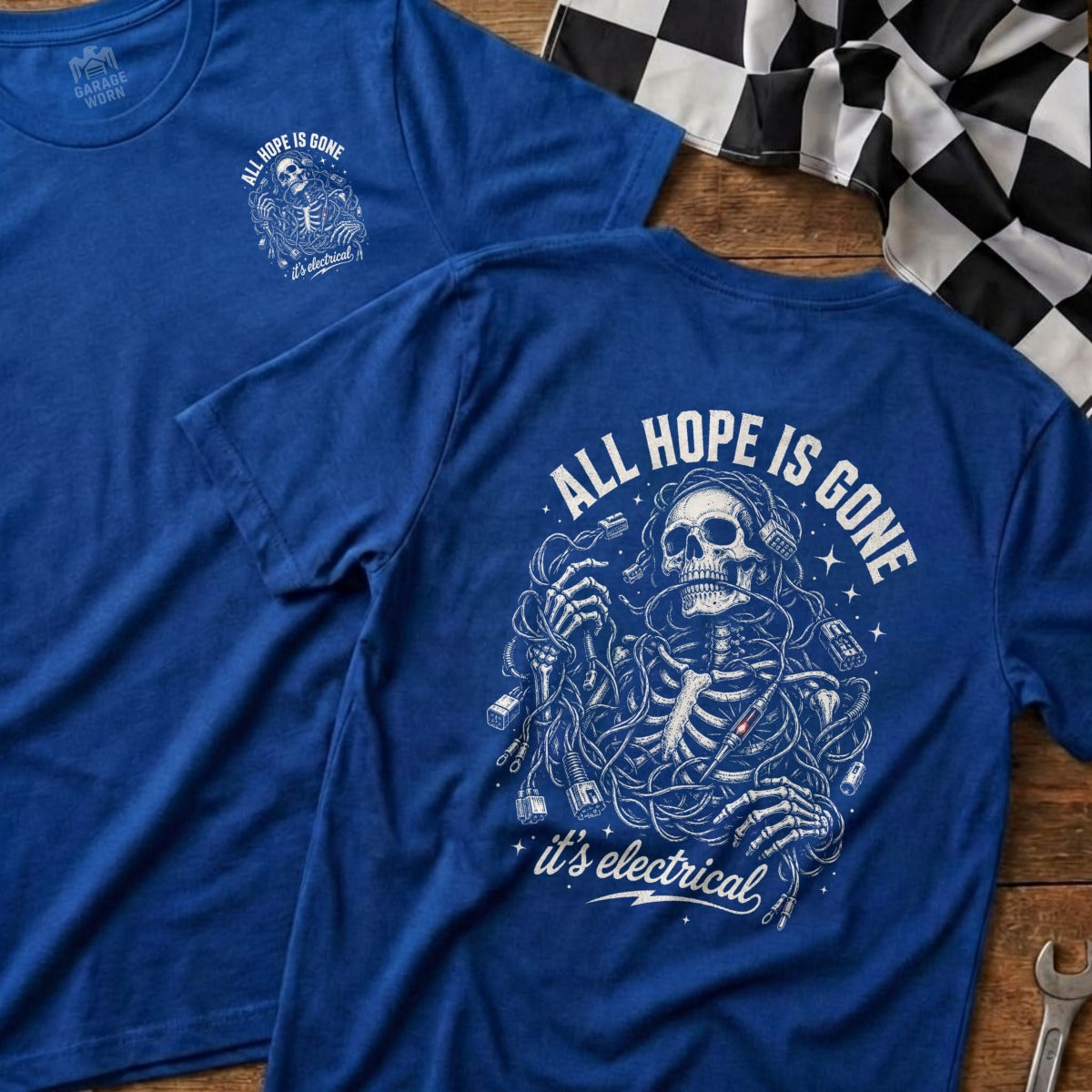 Blue t-shirt with skeleton entangled in wires, text "ALL HOPE IS GONE it's electrical".