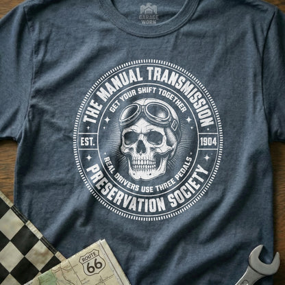 Grey t-shirt with "The Manual Transmission Preservation Society" circular graphic and skull.