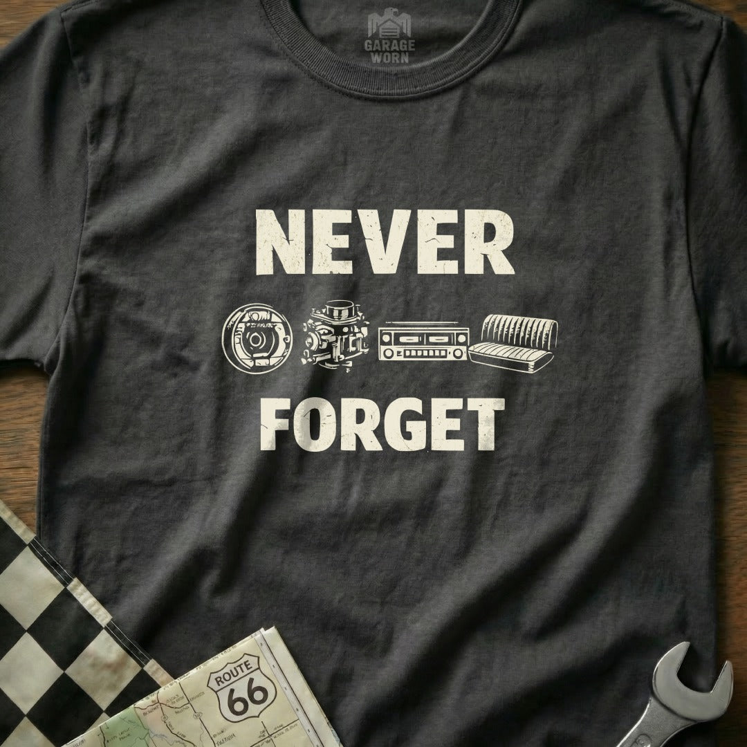 Dark t-shirt with "NEVER FORGET" and car parts: brake drum, engine, radio, seat.
