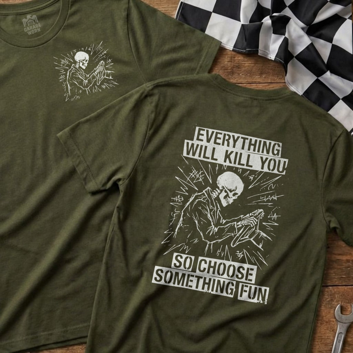 Olive green t-shirt with skeleton driving and "Everything Will Kill You, So Choose Something Fun" text.
