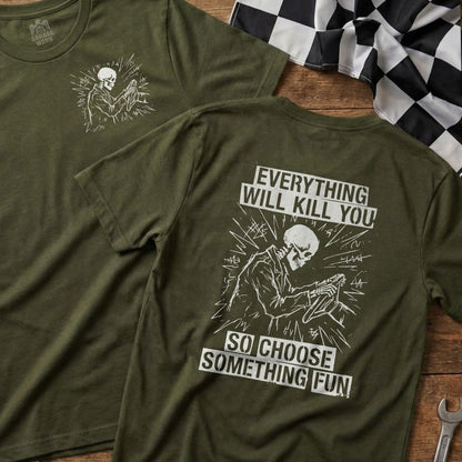 Olive green t-shirt with skeleton driving and "Everything Will Kill You, So Choose Something Fun" text.