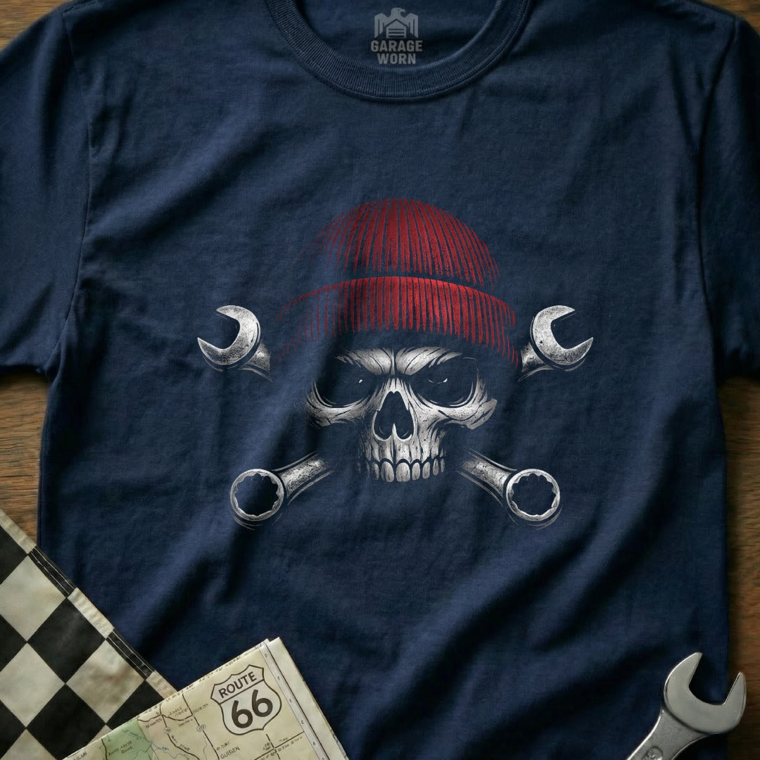 Navy t-shirt with a red beanie-wearing skull and crossed wrenches graphic.