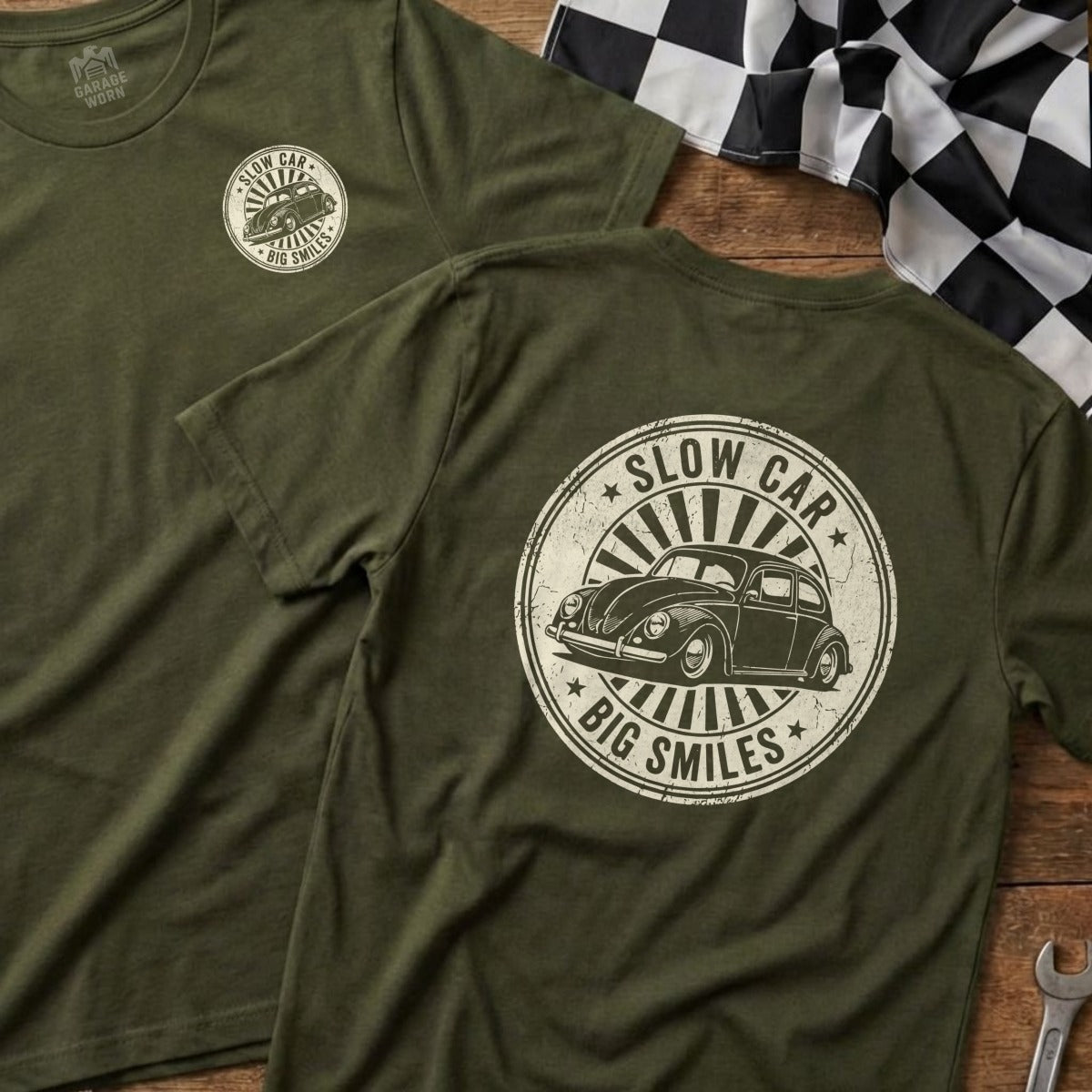Olive green t-shirt featuring a vintage car graphic and "SLOW CAR BIG SMILES" text.