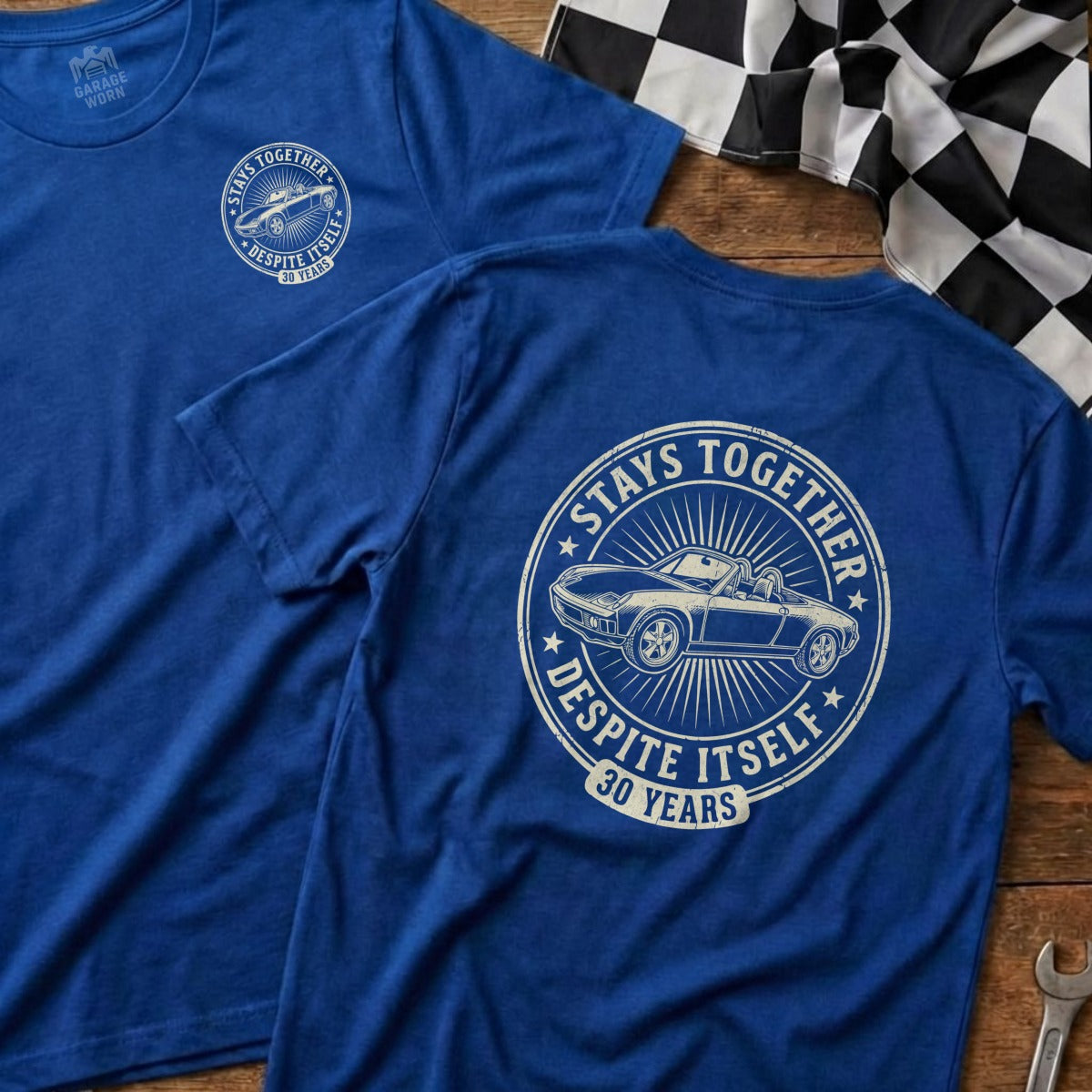 Blue t-shirts with "Stays Together Despite Itself 30 Years" and a car graphic.