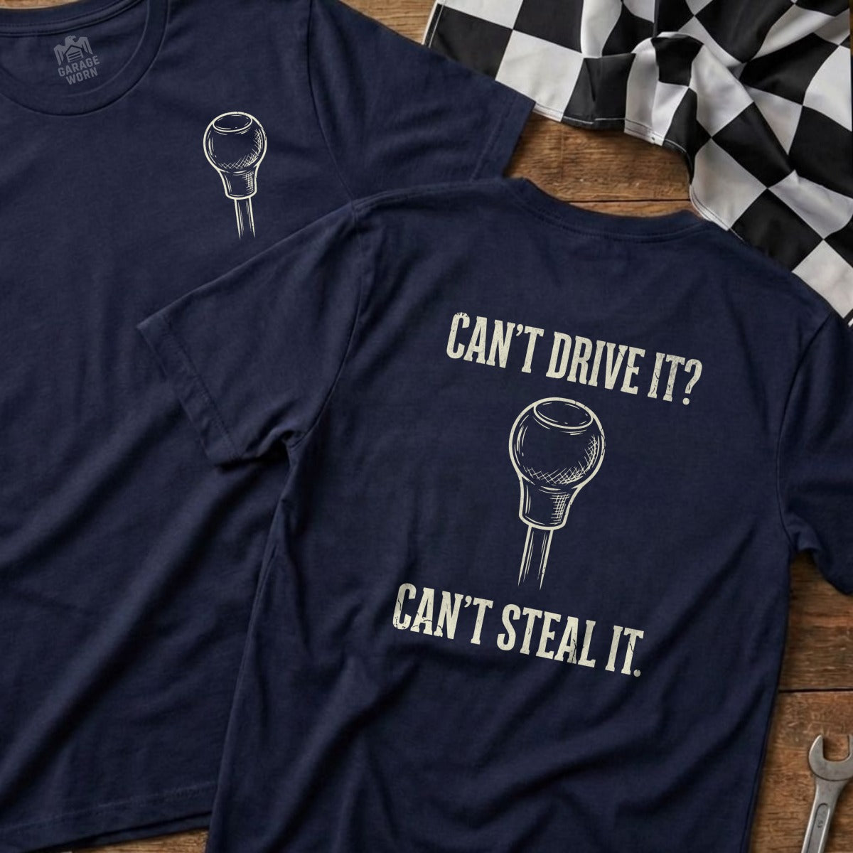 Navy t-shirts with a gear shift graphic and "Can't Drive It? Can't Steal It." text.