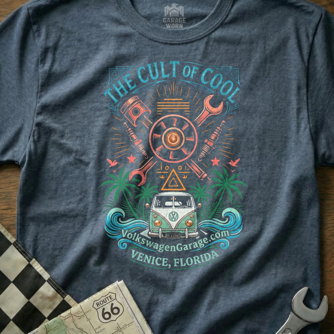 The Cult of Cool shirt features a vintage VW van, waves, palms, and mechanics.
