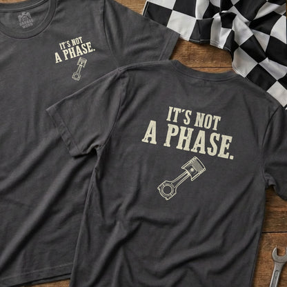 Dark gray t-shirts with "It's Not A Phase." and piston graphic.
