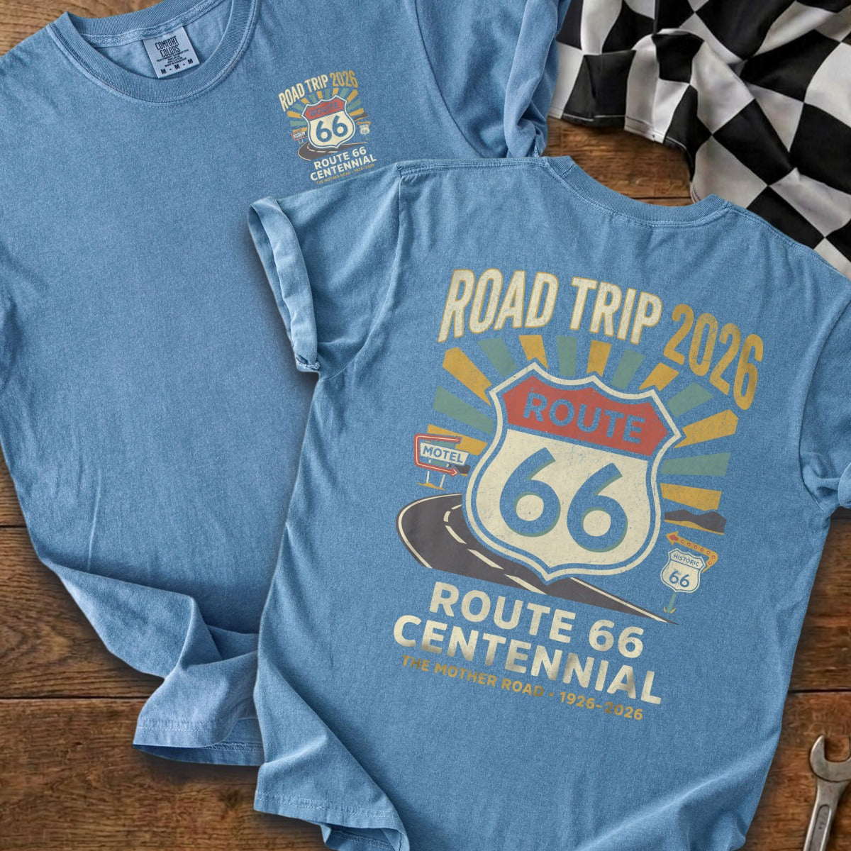 Route 66 Centennial 2026 graphic on a light blue t-shirt.