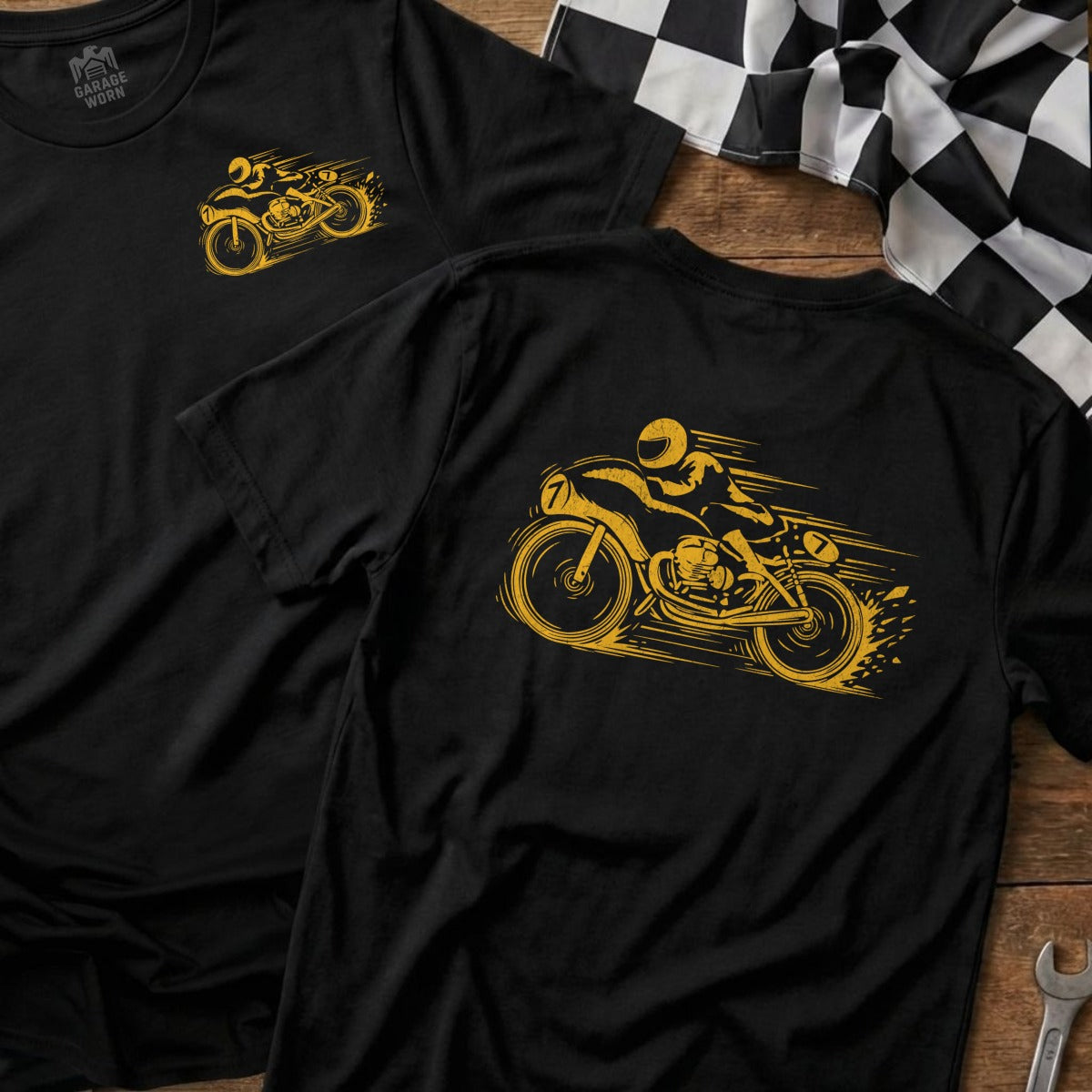 Black t-shirts with yellow graphic of a racing motorcycle and rider.