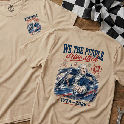 George Washington in a car, "We the People drive stick" graphic, 1776-2026.