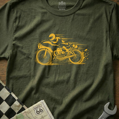 Yellow motorcycle racer graphic on olive green t-shirt with checkered flag and map.