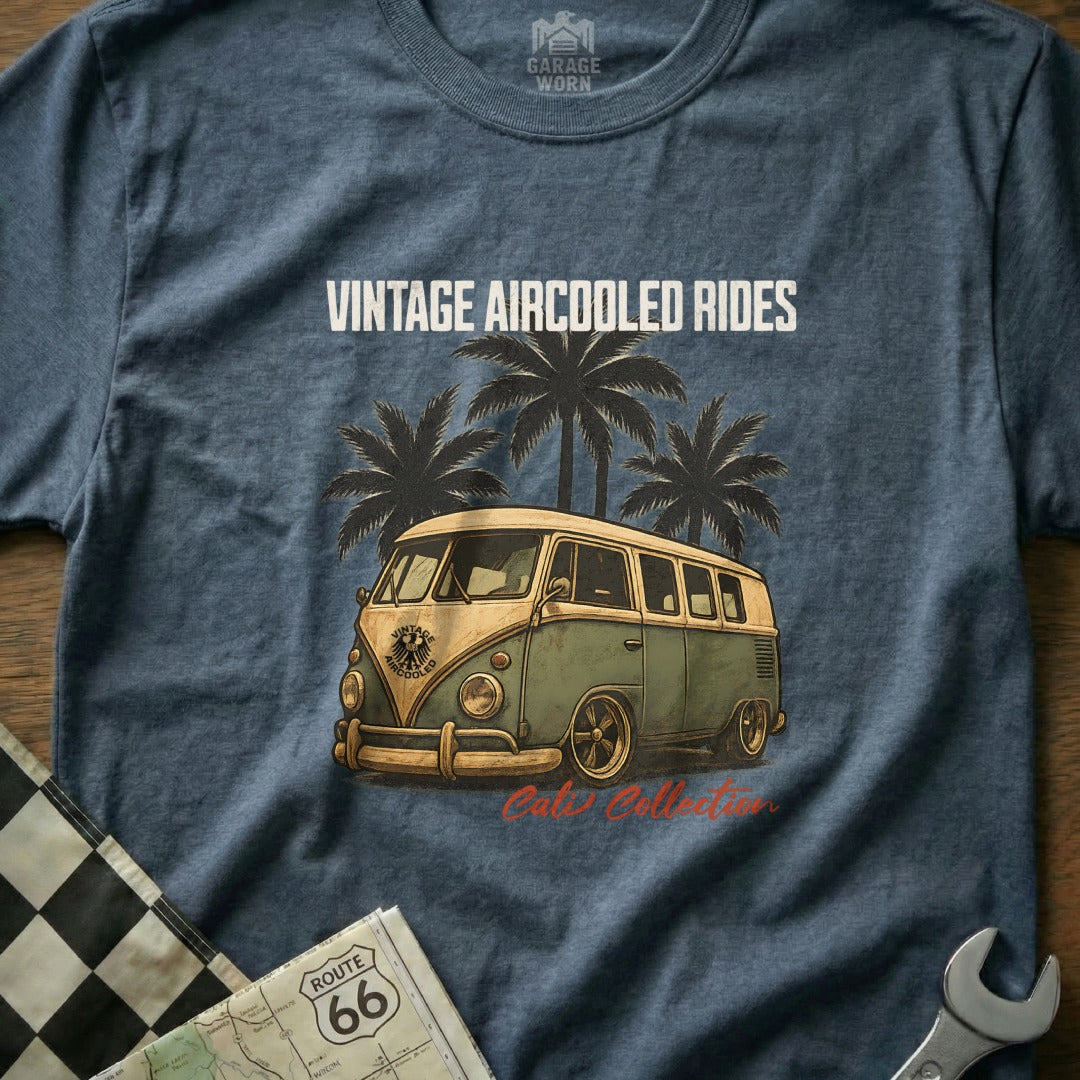 Vintage green and tan Volkswagen bus with palm trees, "Vintage Aircooled Rides" text.