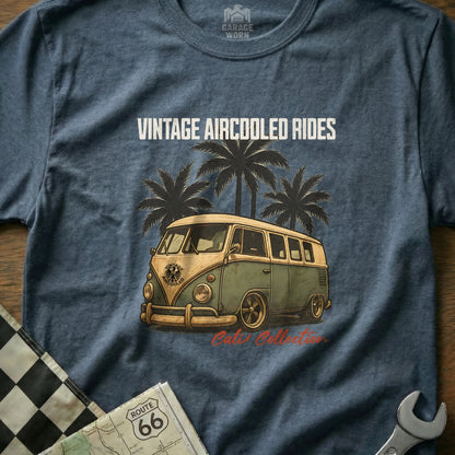 Vintage green and tan Volkswagen bus with palm trees, "Vintage Aircooled Rides" text.