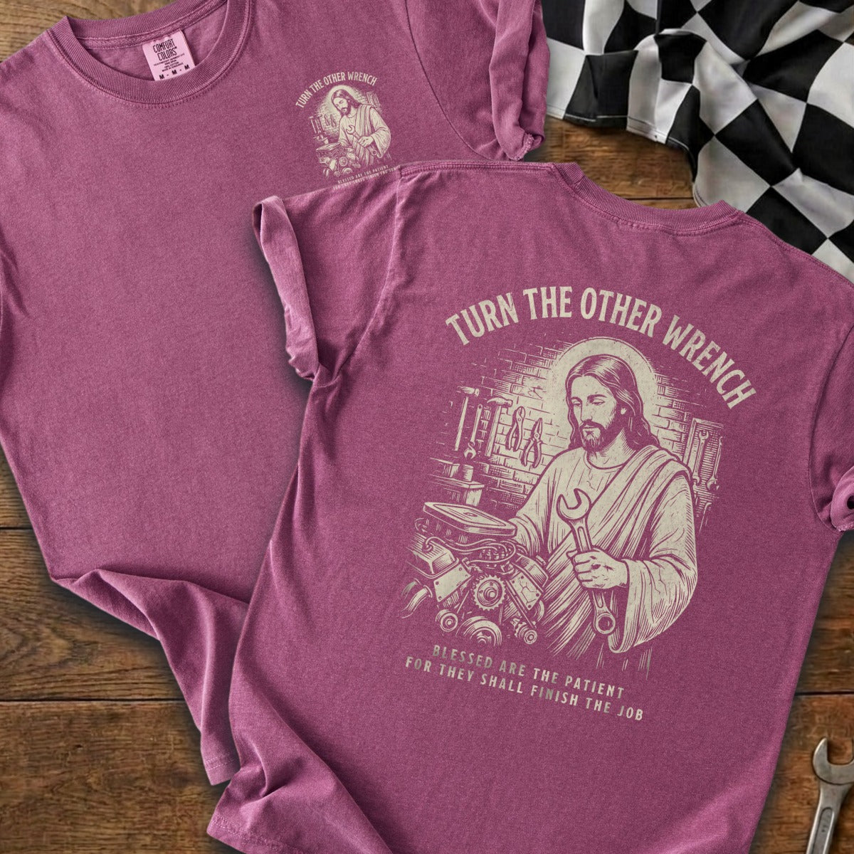 Jesus holding a wrench next to an engine with text "Turn the other wrench."
