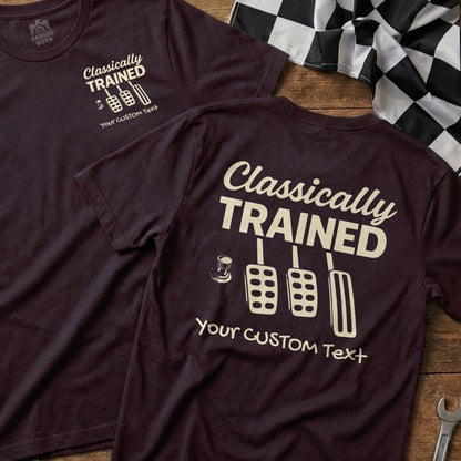Burgundy t-shirt with "Classically Trained" and three pedals graphic.