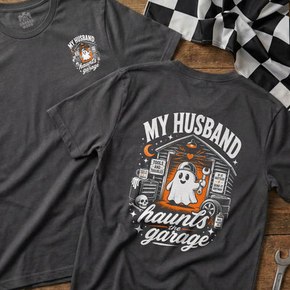 Gray t-shirt with a graphic of a ghost in a garage with tools and the text "My Husband Haunts the Garage".