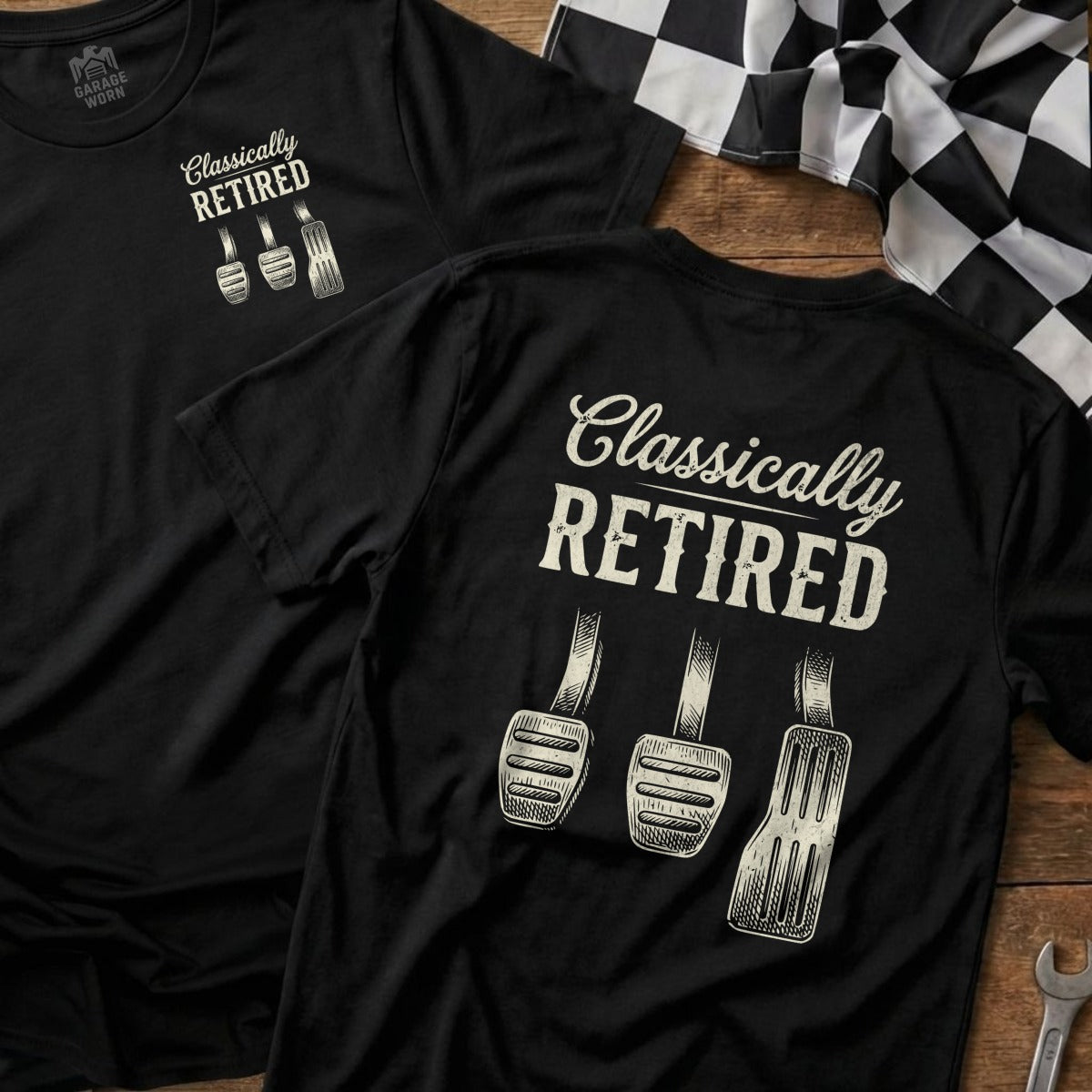 Black t-shirt with "Classically Retired" and gas, brake, clutch pedals.