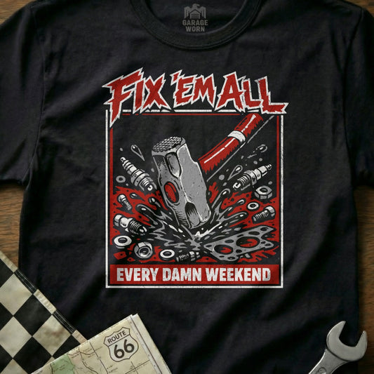 Black t-shirt with "Fix 'Em All" and hammer smashing engine parts design.