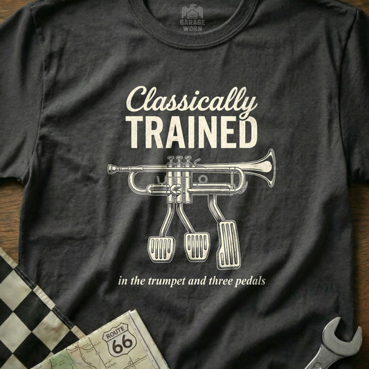 Black t-shirt with "Classically Trained" and trumpet with three pedals graphic.