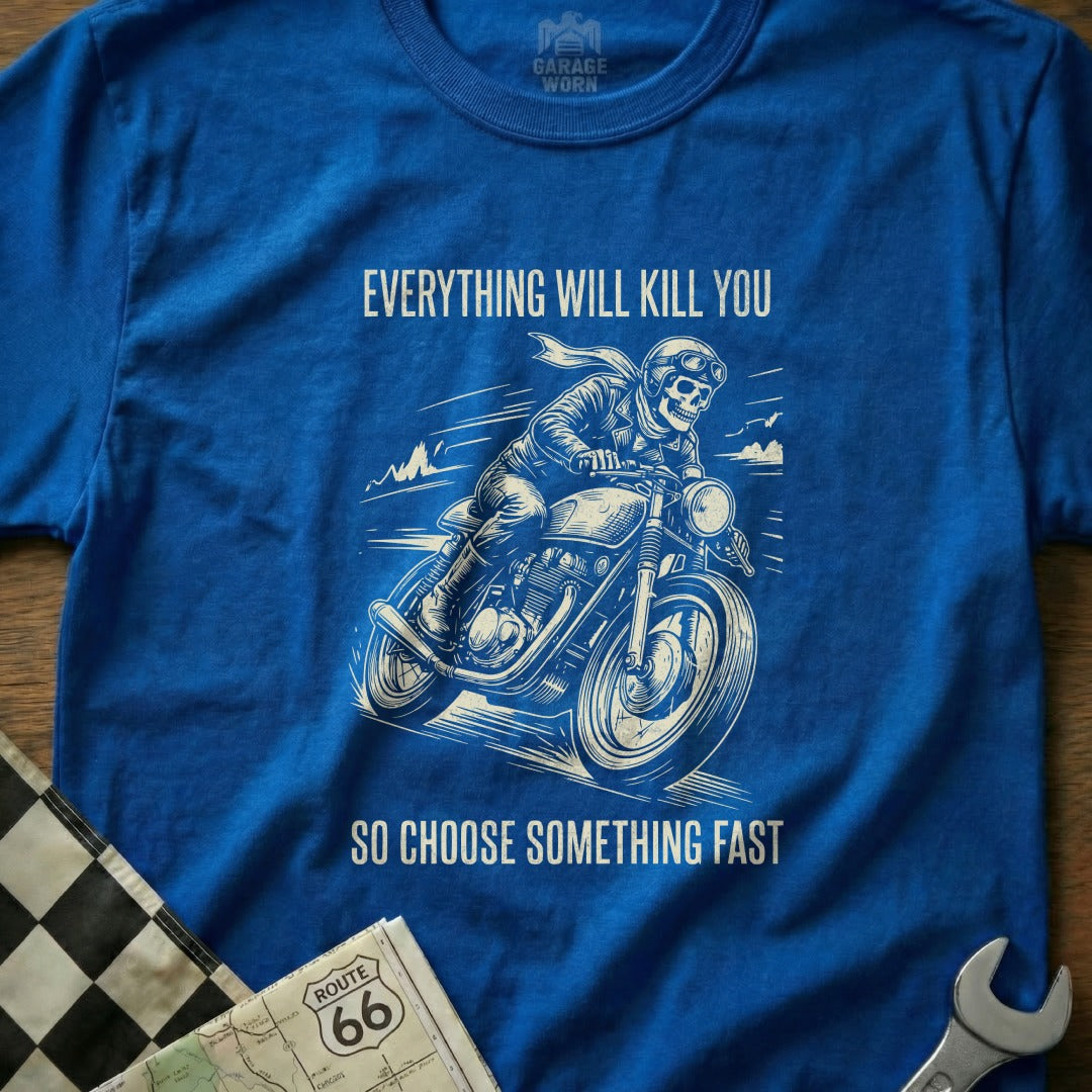 Blue t-shirt with graphic of motorcyclist and text "Everything Will Kill You, So Choose Something Fast."