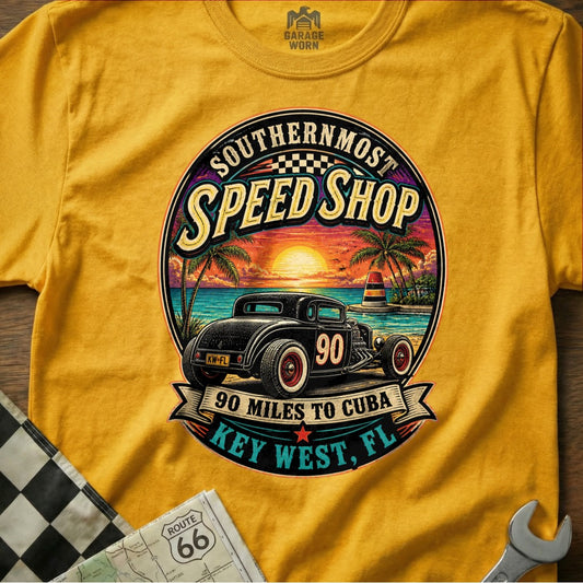 Yellow t-shirt with "Southernmost Speed Shop" graphic featuring a hot rod and beach scene.