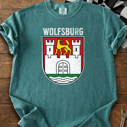 T-shirt with Wolfsburg crest: yellow wolf on white castle on red shield.