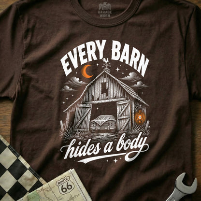 Brown t-shirt with "EVERY BARN hides a body" and barn with car graphic.