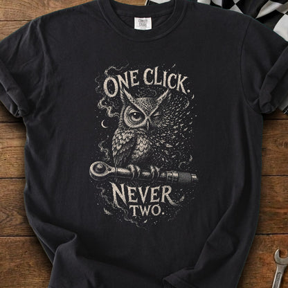 Black t-shirt with distressed graphic of an owl holding a ratchet, text reads "ONE CLICK NEVER TWO".