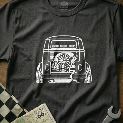 Dark t-shirt with white line drawing of a vintage air-cooled engine in a vehicle.