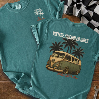 Teal t-shirt with "Vintage Aircooled Rides" text and a vintage van with palm trees.