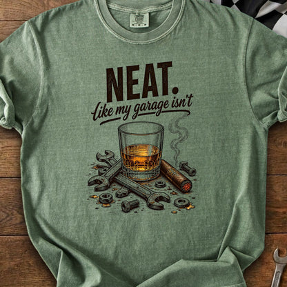 Green t-shirt with "Neat. Like my garage isn't" text, whiskey, cigar, and tools.
