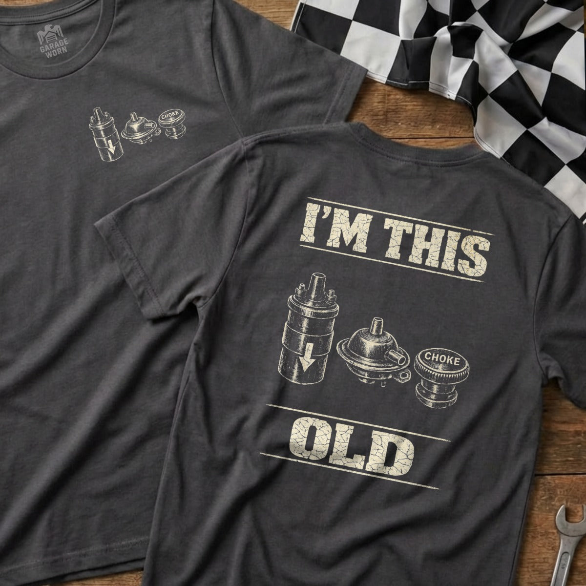 Dark t-shirt with vintage car ignition coil and choke graphics.