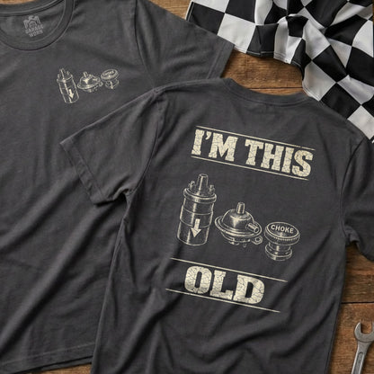 Dark t-shirt with vintage car ignition coil and choke graphics.