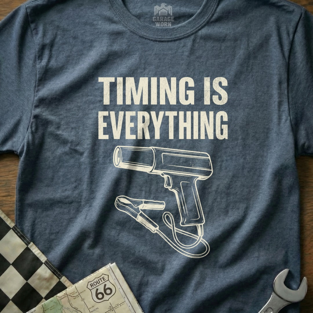 T-shirt with "Timing is Everything" text and illustration of a timing light.