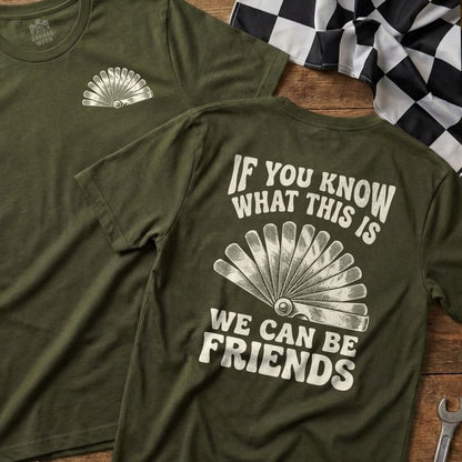 Green t-shirt with a fan tool and "If you know what this is we can be friends" text.