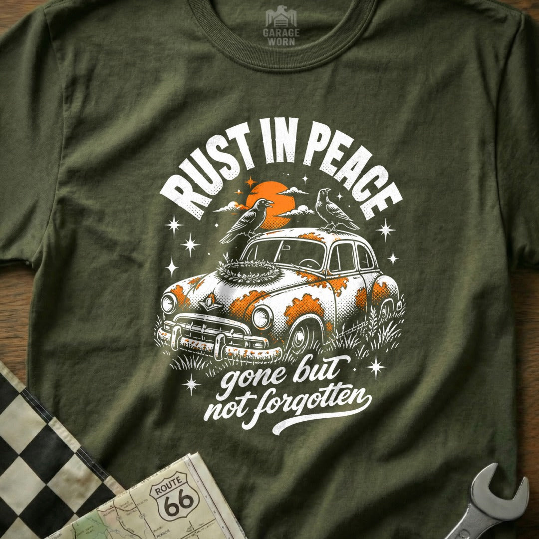 T-shirt graphic: "Rust in Peace, gone but not forgotten" text and a rusted car.