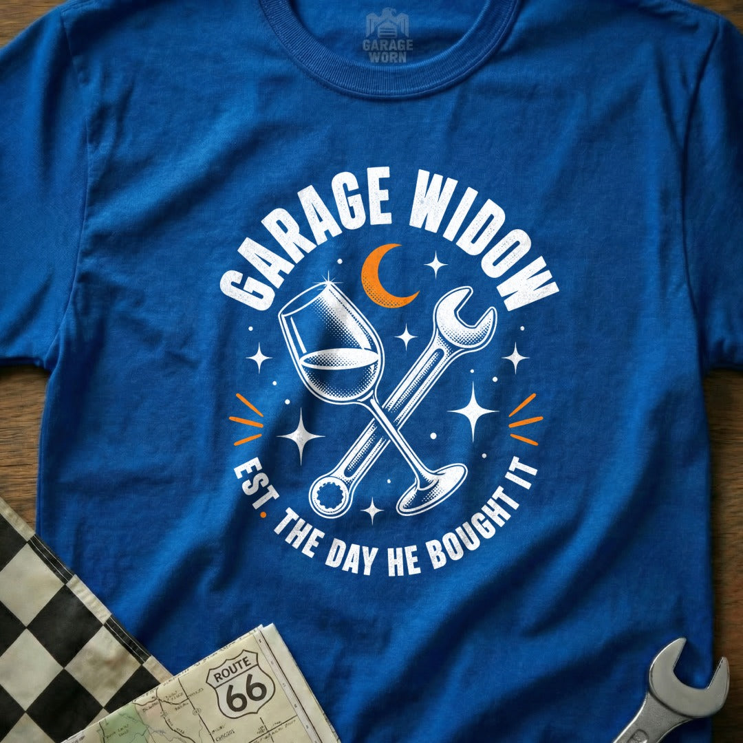 Blue t-shirt with "Garage Widow Est. The Day He Bought It" text and graphics.